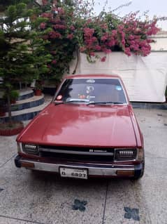 Toyota Corolla 1982 GL saloon red color