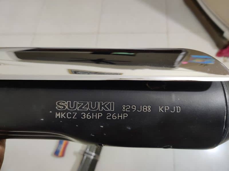 Suzuki gr150 original silencer with Akrapovic exhaust 3