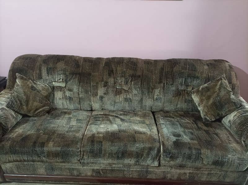 5 seater brown textured sofa set . 0