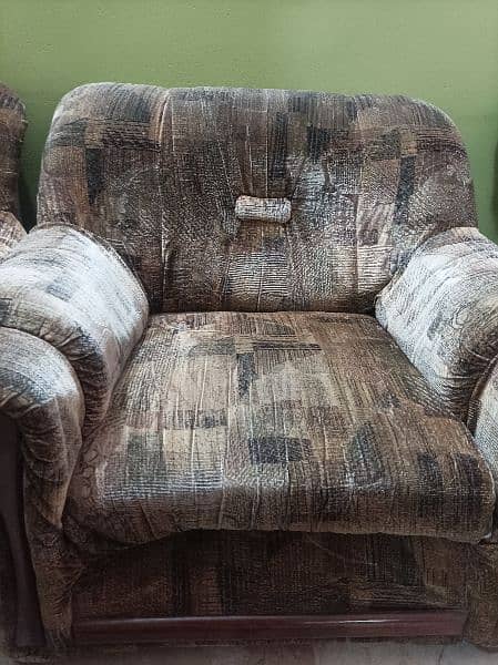 5 seater brown textured sofa set . 2