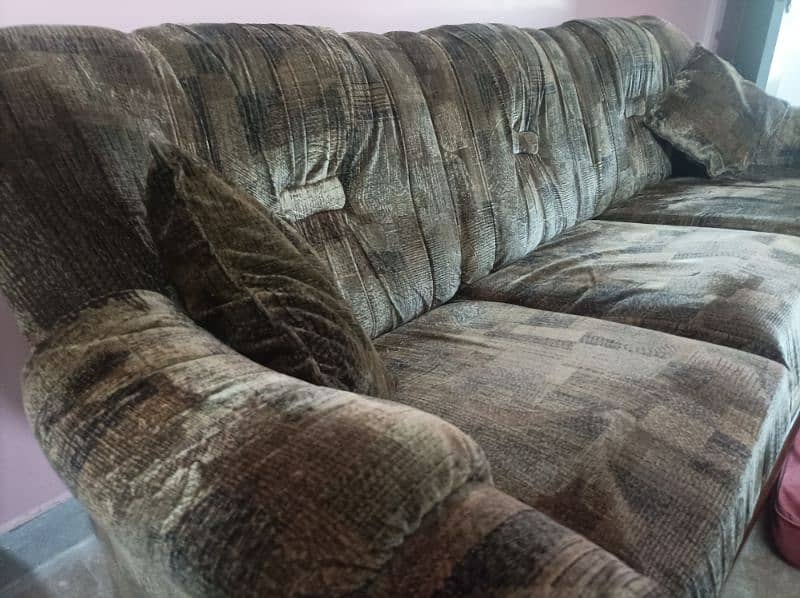 5 seater brown textured sofa set . 4