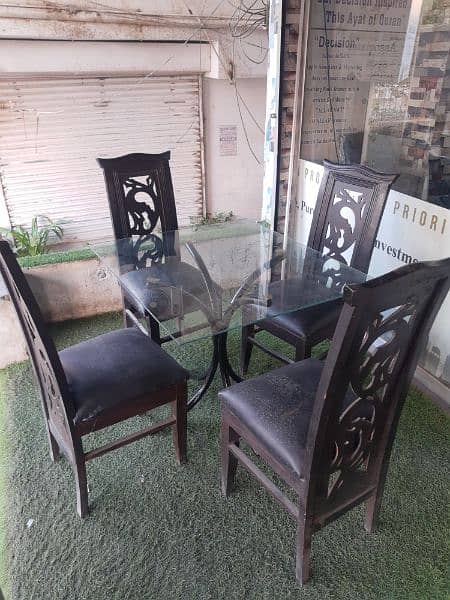 very compact Dining table 4 wooden chairs & metal base glass top table 2