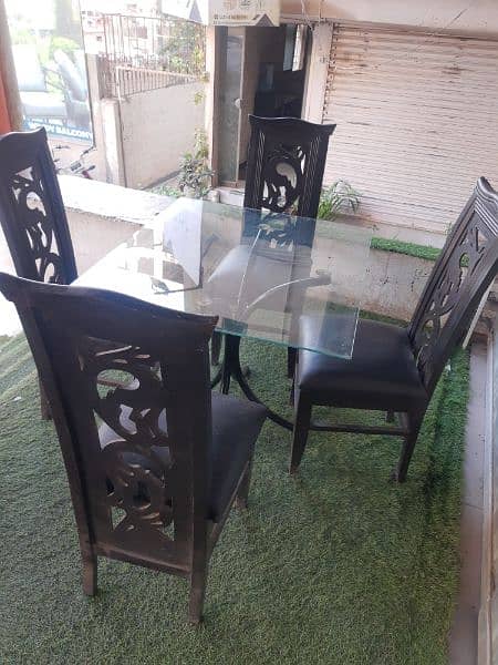 very compact Dining table 4 wooden chairs & metal base glass top table 3