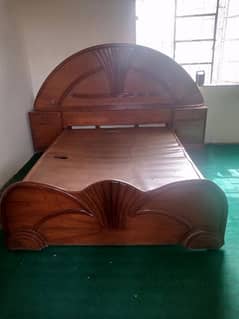 queen size bed with fixed side tables
