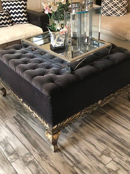 black coffee table for 25,000 and set of golden racks for 35,000 8