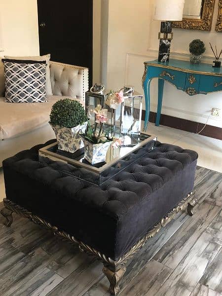 black coffee table for 25,000 and set of golden racks for 35,000 9