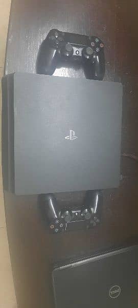 PS 4 Slim 500GB with 2 Controllers. 10/10 Condition. 1