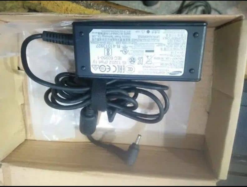 laptop charger available with one month warranty 14