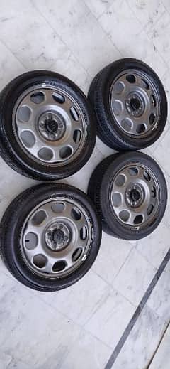 Suzuki Hustler OEM Rims and tyres 165/55R15 0