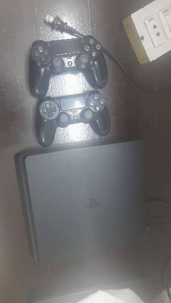 PS 4 Slim 500GB with 2 Controllers. 10/10 Condition. 6