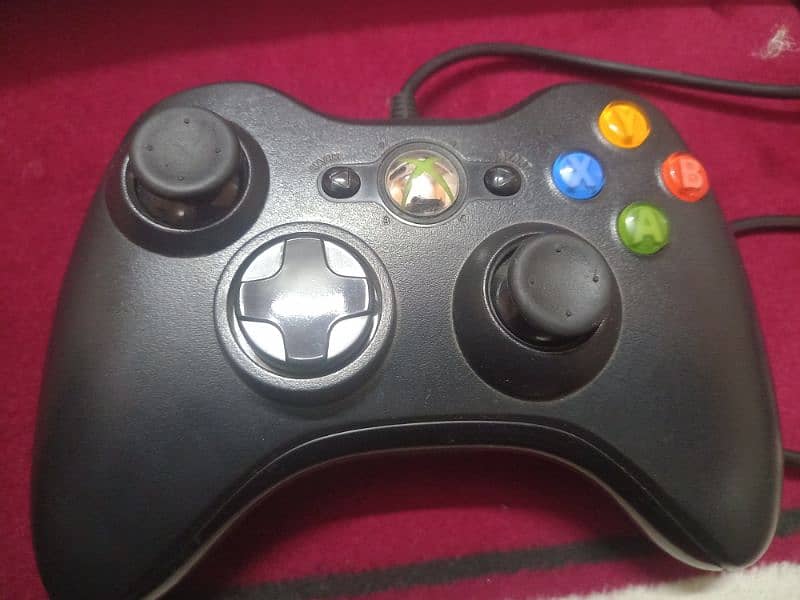 xbox 360 with 2 controllers and box 4