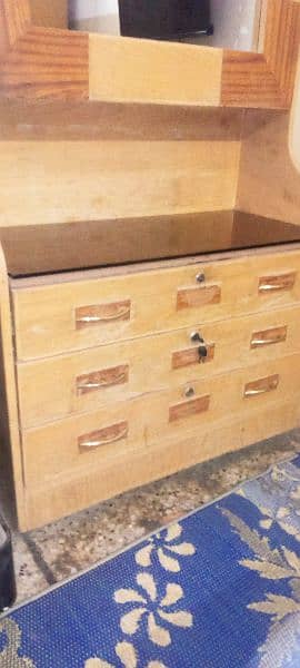 dressing table with 3 drawers and 4 shelves. . urgent sale. . 2