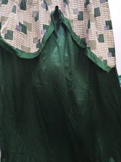 Sets of green curtains