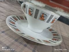 cups and saucers with metal holders