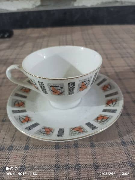 cups and saucers with metal holders 1
