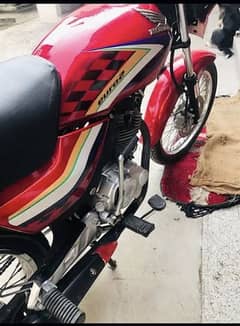 Honda Deluxe Red in lush Condition only wats app