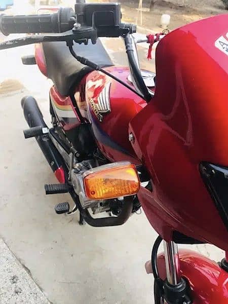 Honda Deluxe Red in lush Condition only wats app 3