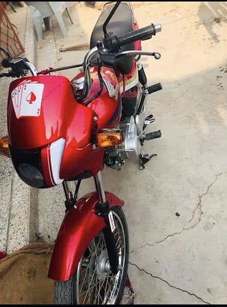 Honda Deluxe Red in lush Condition only wats app 7