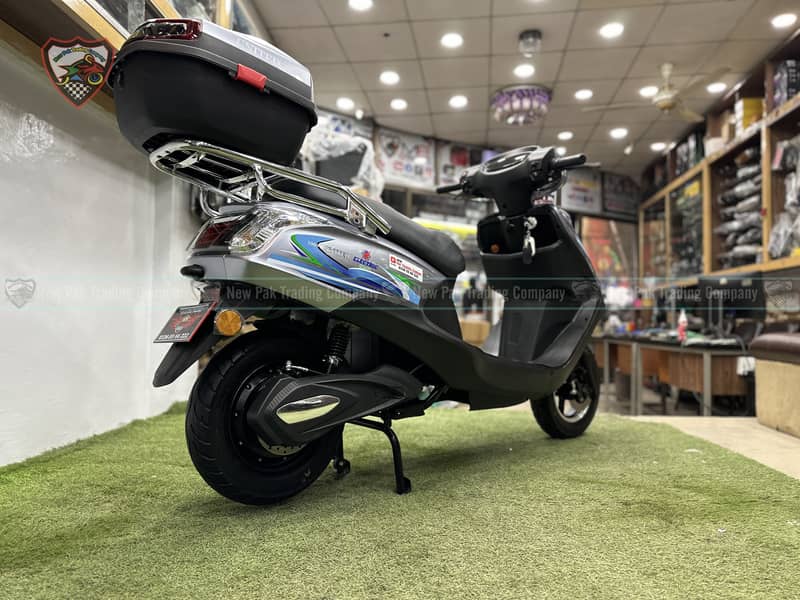 United Ev Sharp Scooty WithTail Box 6