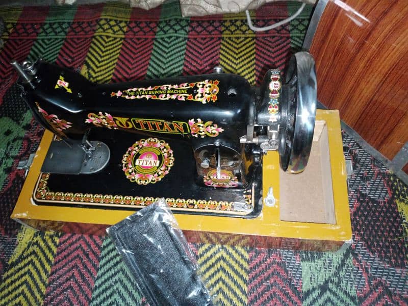 Titan sewing machine is New . with Motor. 1