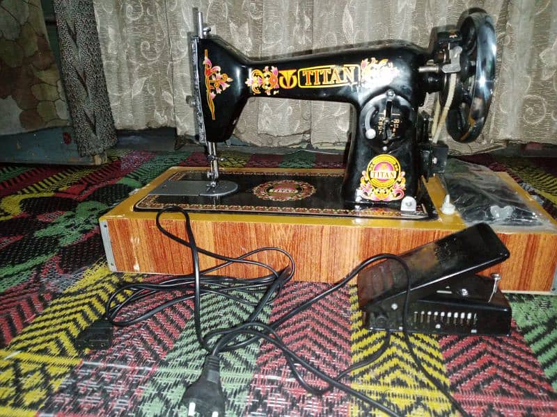 Titan sewing machine is New . with Motor. 4