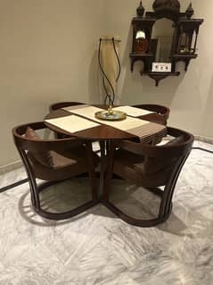 4 seats and dining table