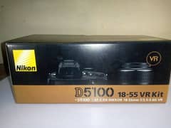 Nikon D5100 with 18-55mm+28-300mm
