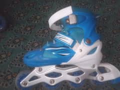 inline blue skating shoes with extend feature for call # 03224833039
