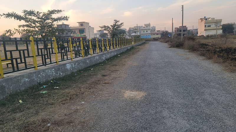 8 Marla level plot Near to Markaz and Central park on Main Double Road and Access Road to Airport for Sale 0