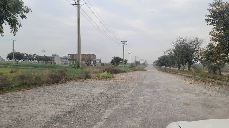 8 Marla level plot Near to Markaz and Central park on Main Double Road and Access Road to Airport for Sale 2