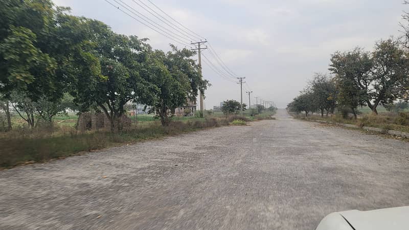 8 Marla level plot Near to Markaz and Central park on Main Double Road and Access Road to Airport for Sale 3