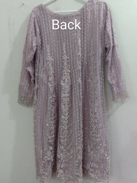 Embroidered net frock with silk trouser and crape dupatta. 1