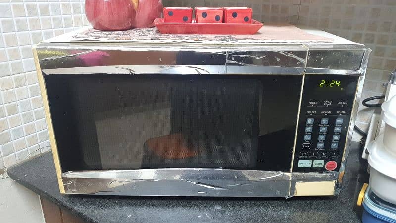 one PEL and One LG Microwave Oven for sale 0