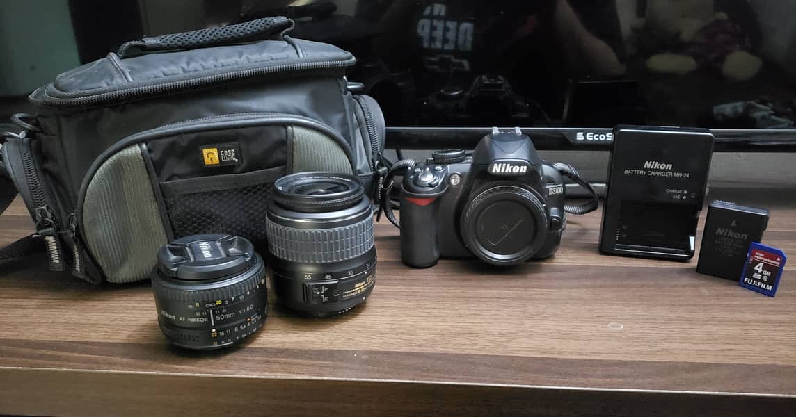 Nikon D3100 with 18-55 & 50MM, Bag, Charger and 4GB card//Urgent Sale 0