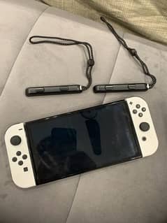 Nintendo switch OLED model white color with 3 games and carrying case