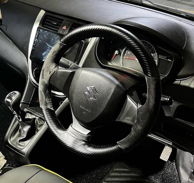 Carbon fiber Alcantra steering cover. . 0