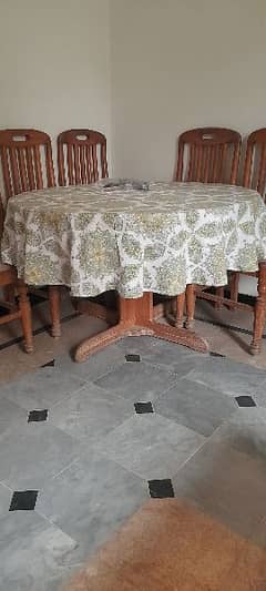 wooden round dining table