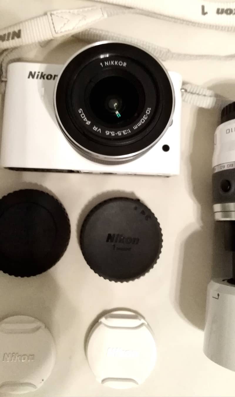 Nikon 1 J1 Mirrorless with 2 Lenses 10-30mm VR & 30-110mm VR 7