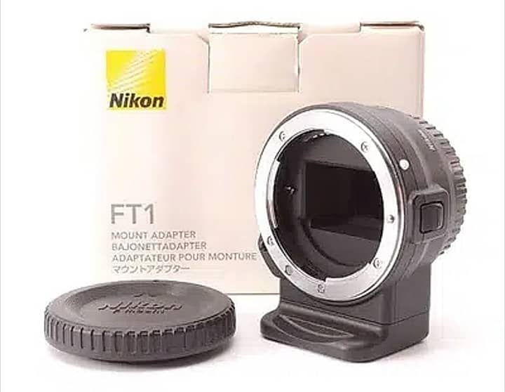 Nikon 1 J1 Mirrorless with 2 Lenses 10-30mm VR & 30-110mm VR 12