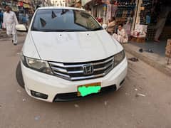Honda city 2015 aspire 1.5 auto first owner White color