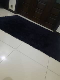 Black shaggy rug 7feet by 5feet