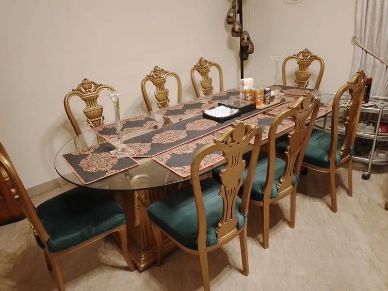 8 seater glass top Dining table with elegant chairs 0
