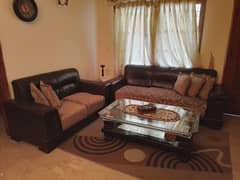 7 seater lounge sofa set with a center table and two side tables