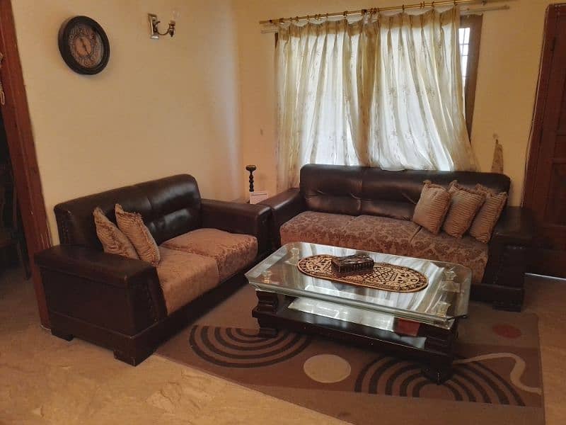7 seater lounge sofa set with a center table and two side tables 1