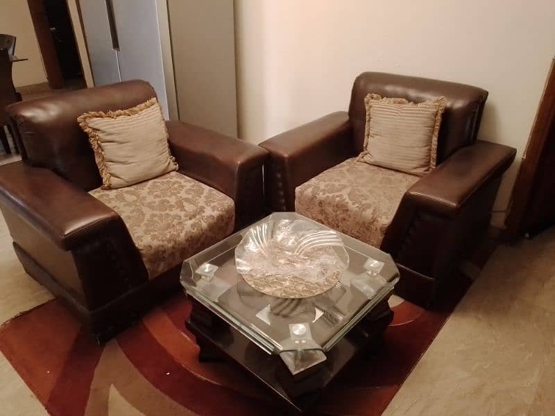 7 seater lounge sofa set with a center table and two side tables 2
