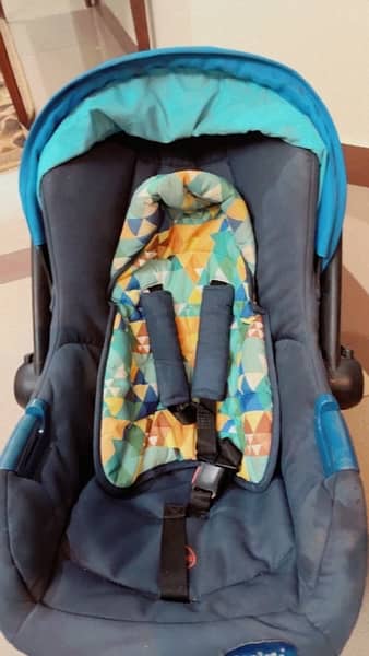 baby shop car seat and carrying cot 1