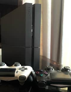 Ps4 1TB for sale; with 2 Contorllers & 4 Games