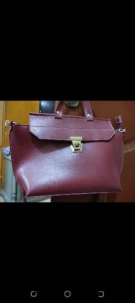 ladies bag for sale in maroon color, available in reasonable price 2