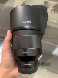 samyang 85 1.4  EF Lens for sony condition just box open 1  time used