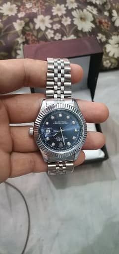 brand new Rolex watch hai 5 sal ki warranty ke sath waterproof be ha